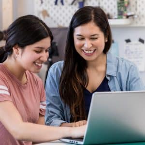 Teen (Native American) on computer, seeks adult help