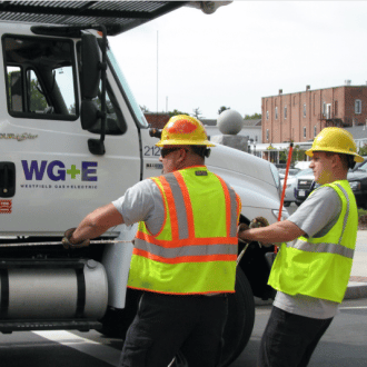 WG&E engineers pull fiber during network installation