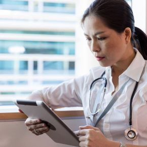 doctor using tablet