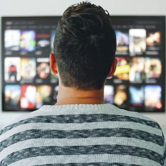 man watching tv