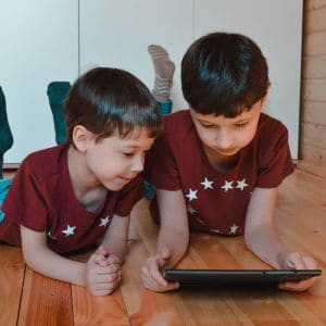Kids on tablet at home