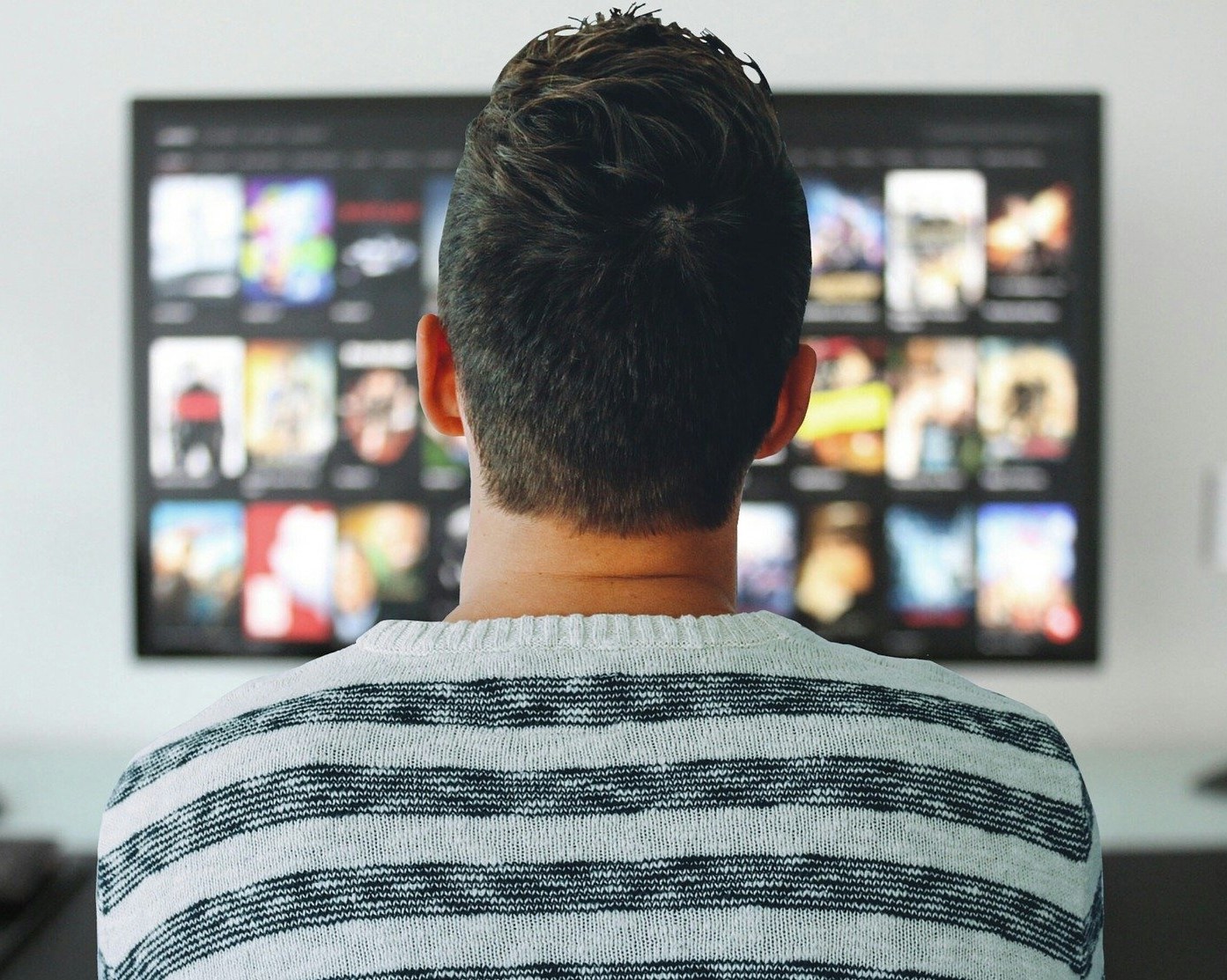 man watching tv
